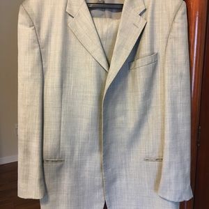 Zacchi grey four button down suit.